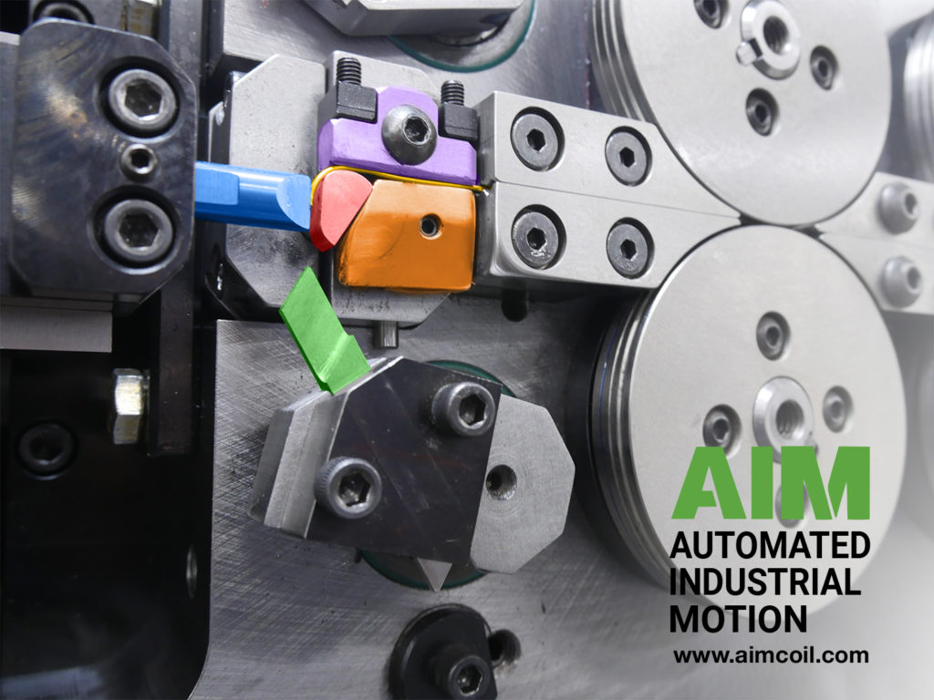 Comparing dual & single point spring coilers | Automated Industrial Motion
