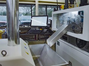 AIM 2000 custom coiling setup showing AIM's custom machine design and build capabilities