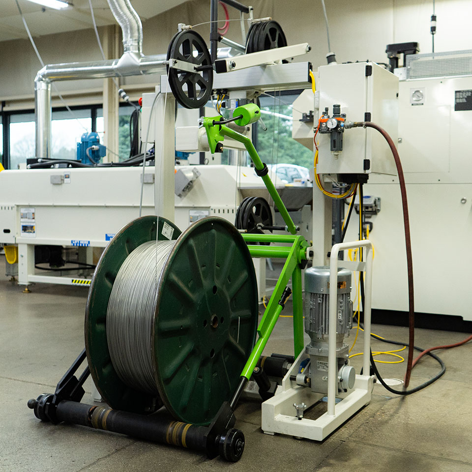 AIM 2100 powered wire payoff wire dereeler