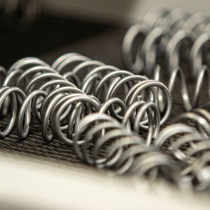 Closeup on compression springs coiled at AIM