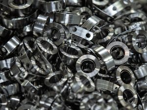 Production run of constant force springs illustrating contract spring manufacturing carried out by Automated Industrial Motion