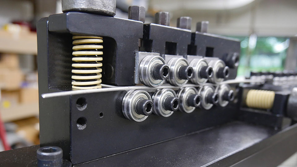 wire straighteners, automated industrial motion, spring coiling and wire forming machines, spring coiling equipment, wire forming equipment